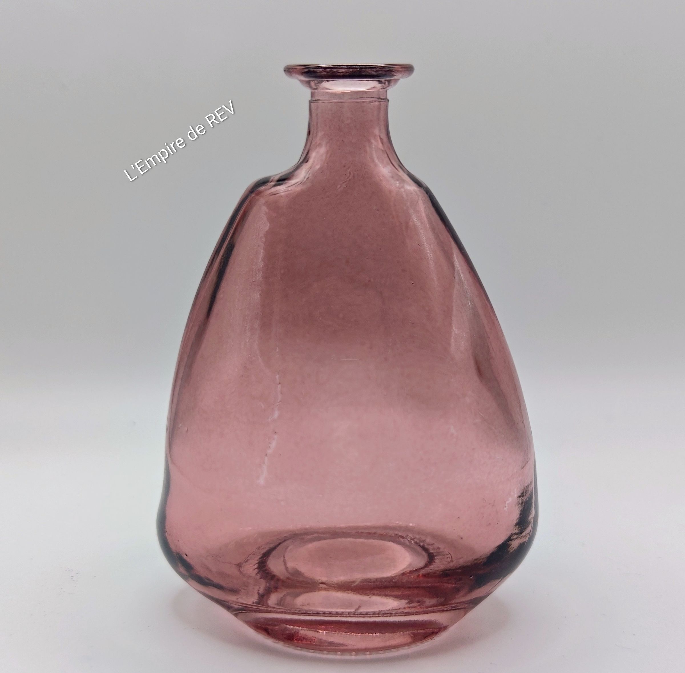 Bouteille en verre pour fleurs en cire