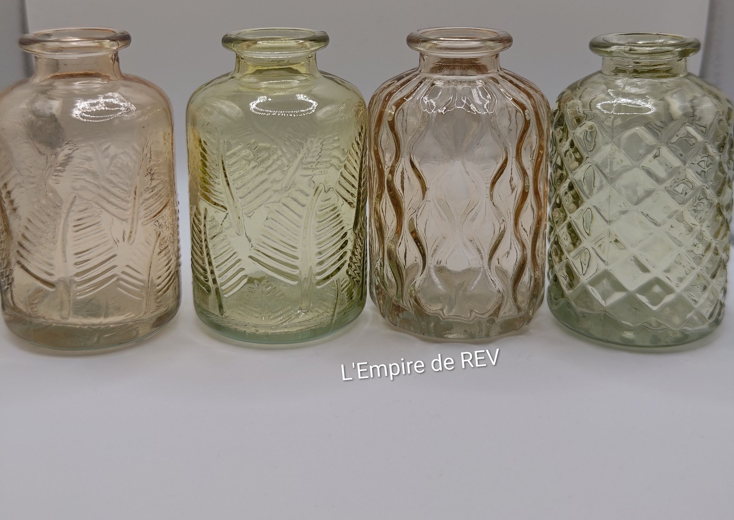 Bouteille en verre pour bouquet de fleurs en bougie