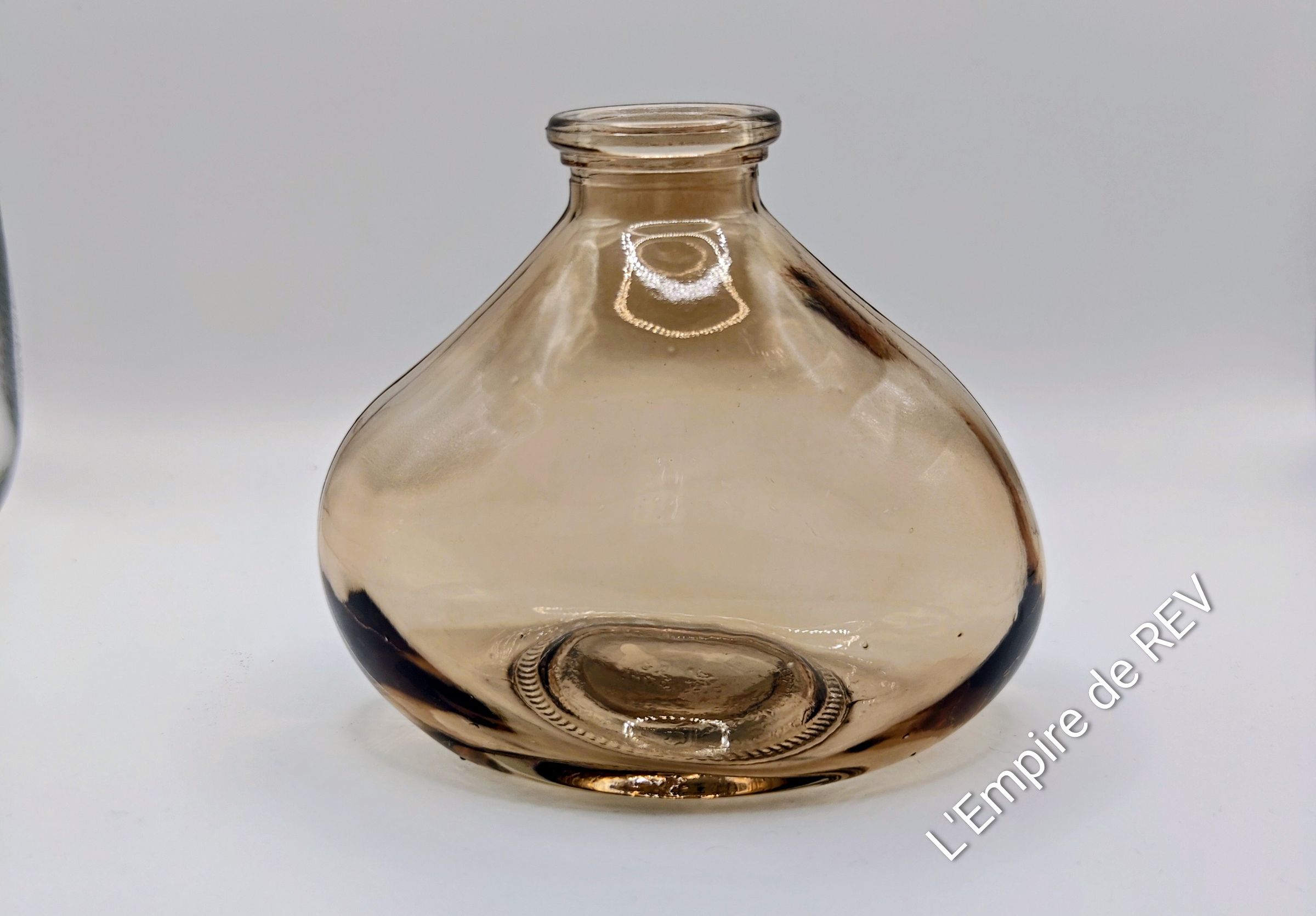 Bouteille en verre pour fleurs en cire