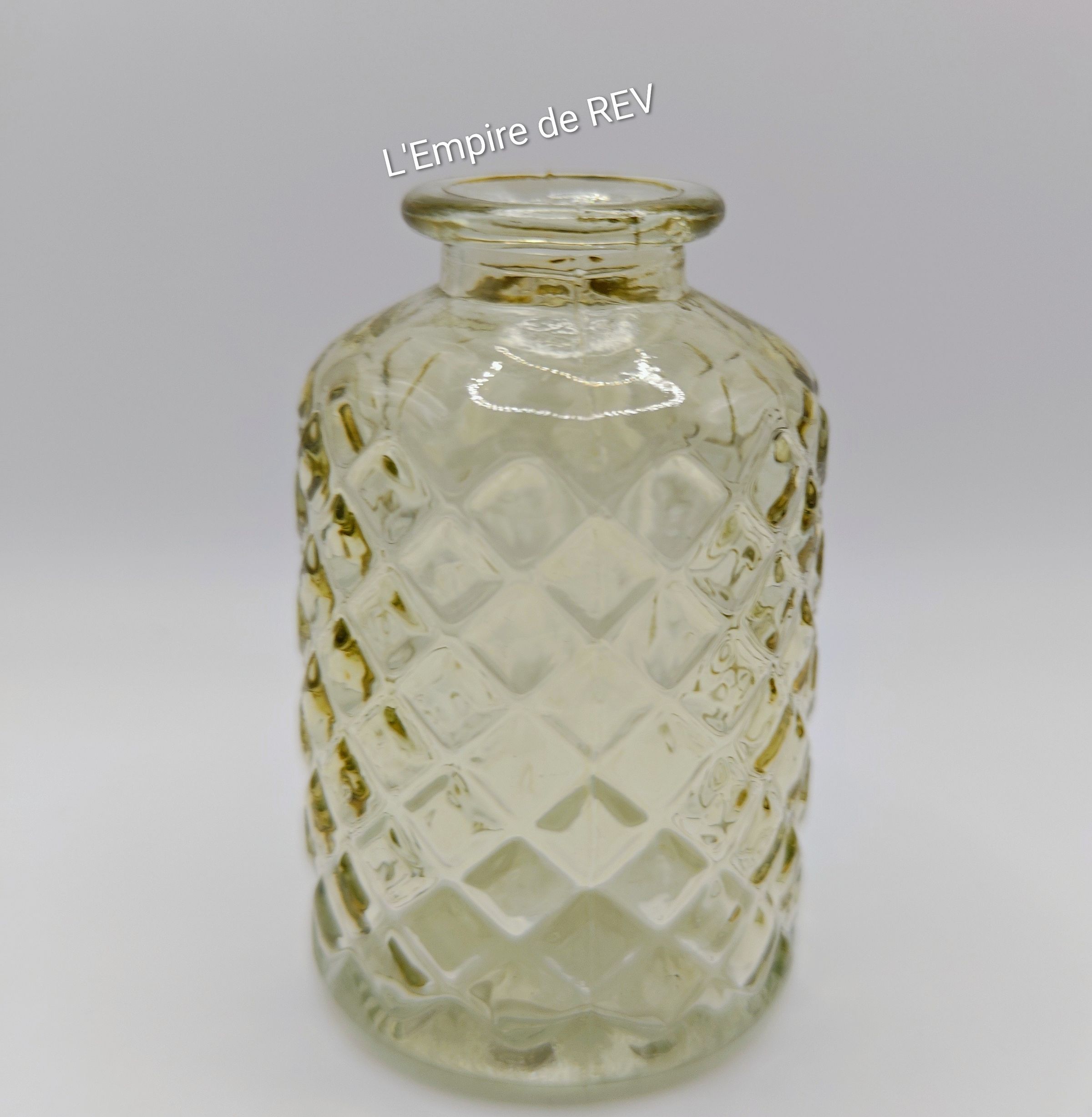 Bouteille en verre pour bouquet de fleurs en bougie