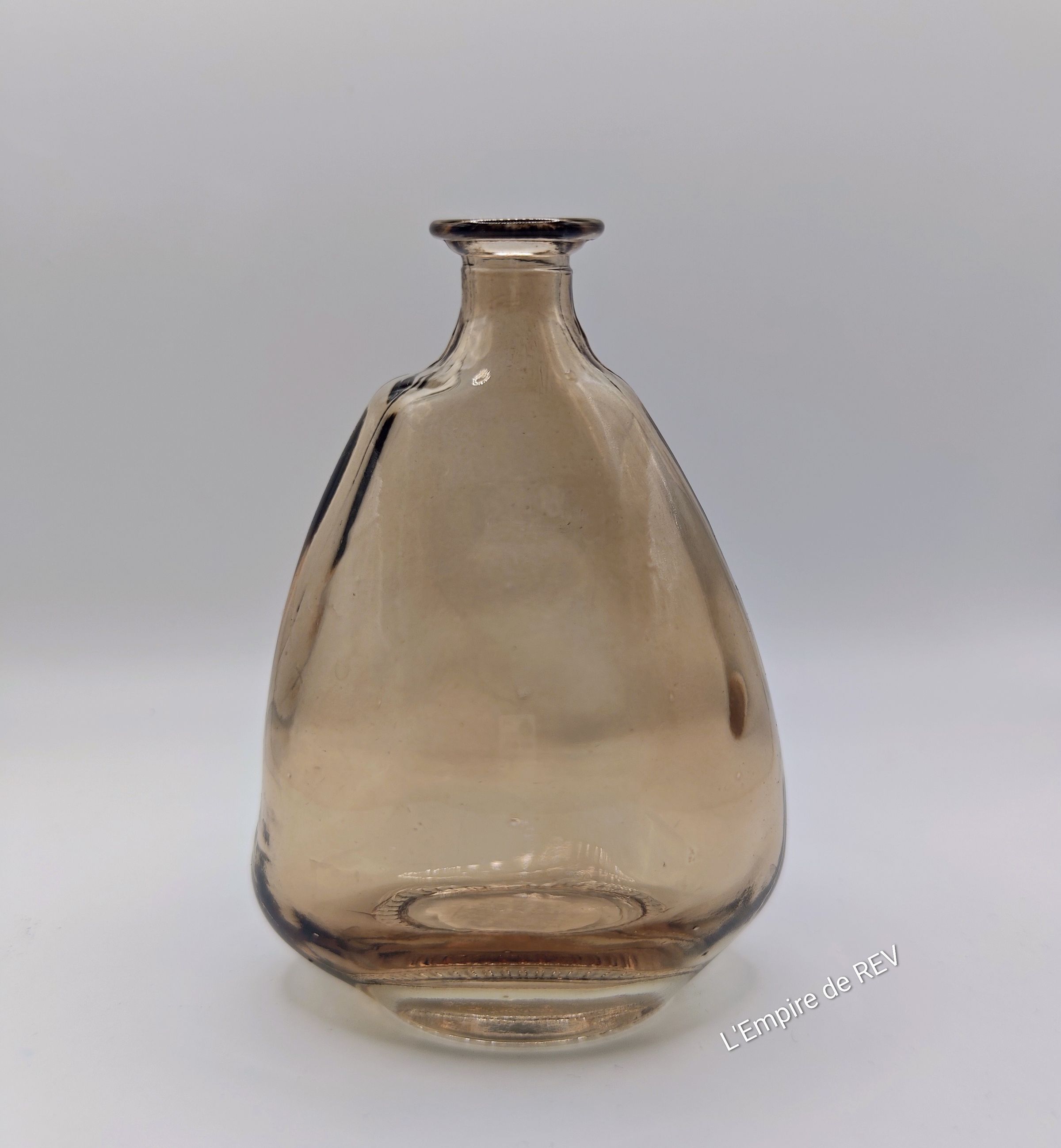 Bouteille en verre pour fleurs en cire