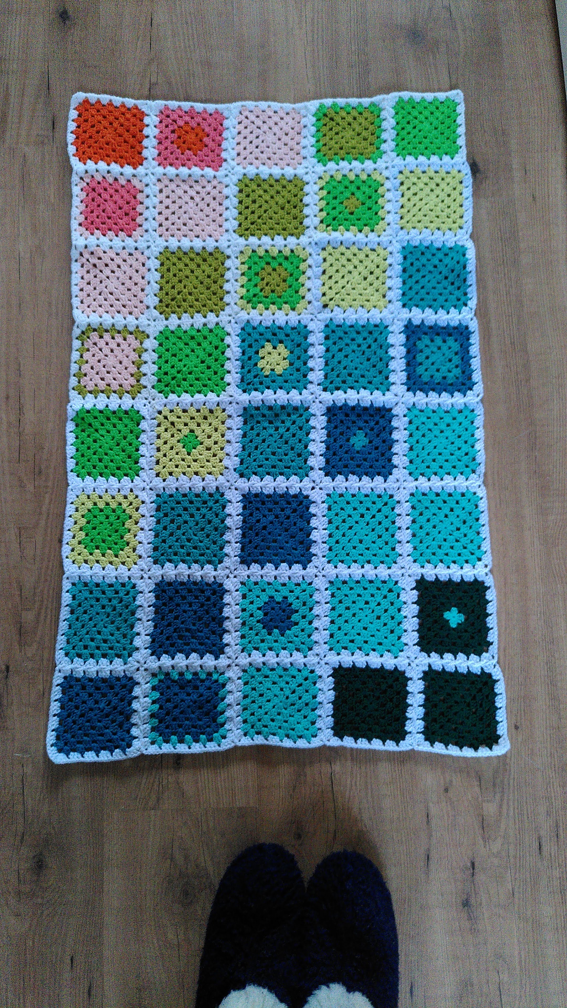 Baby blanket with granny squares from left over yarn