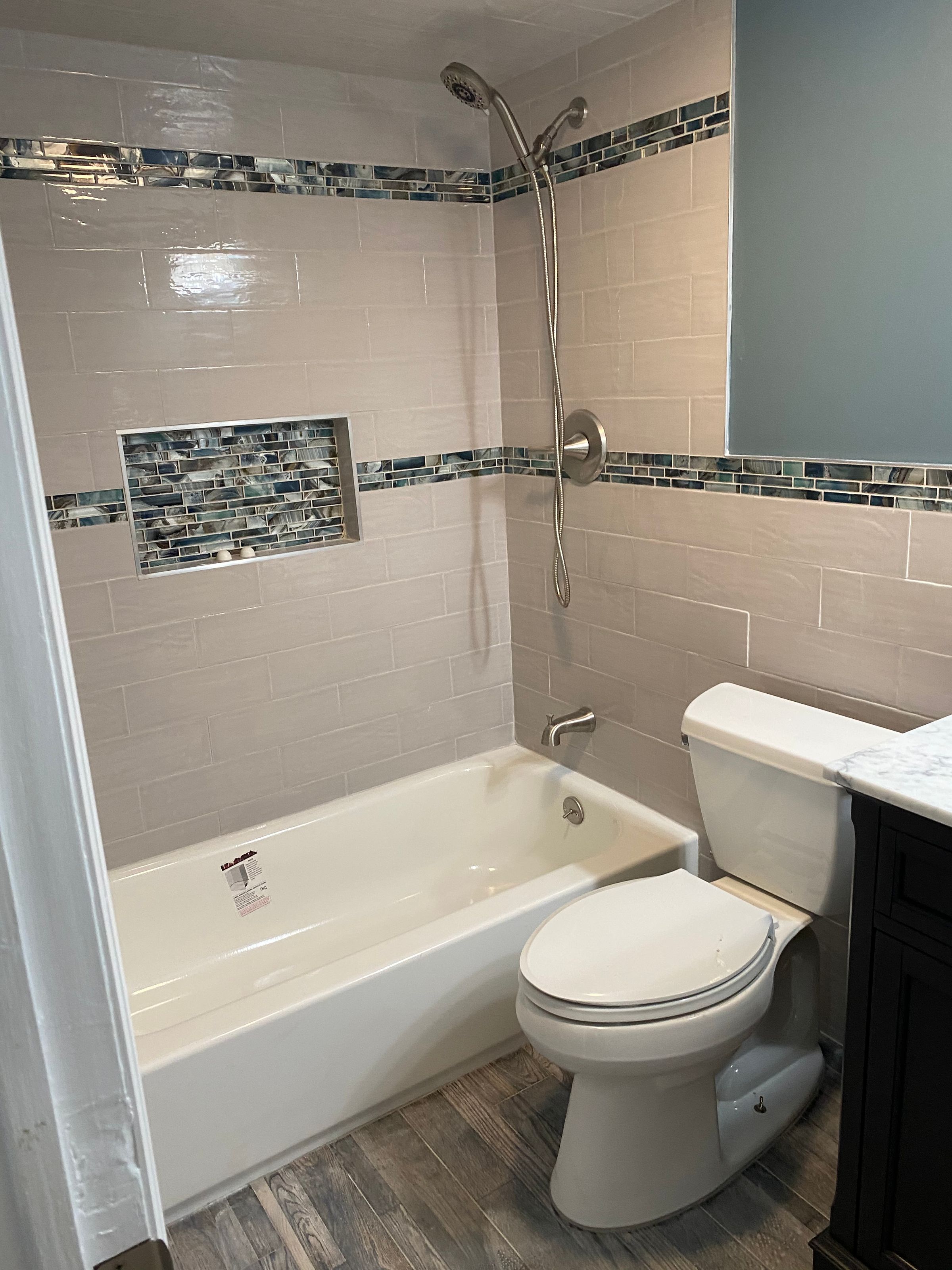 Bathroom With Custom Tile Accent