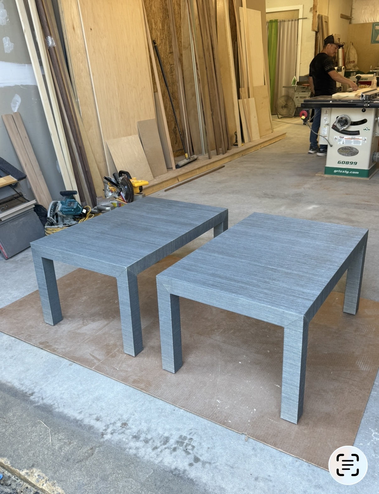 Tables custom built and wrapped in grass cloth for Price Segal of Thise Thumbs Up Guys attorney’s 