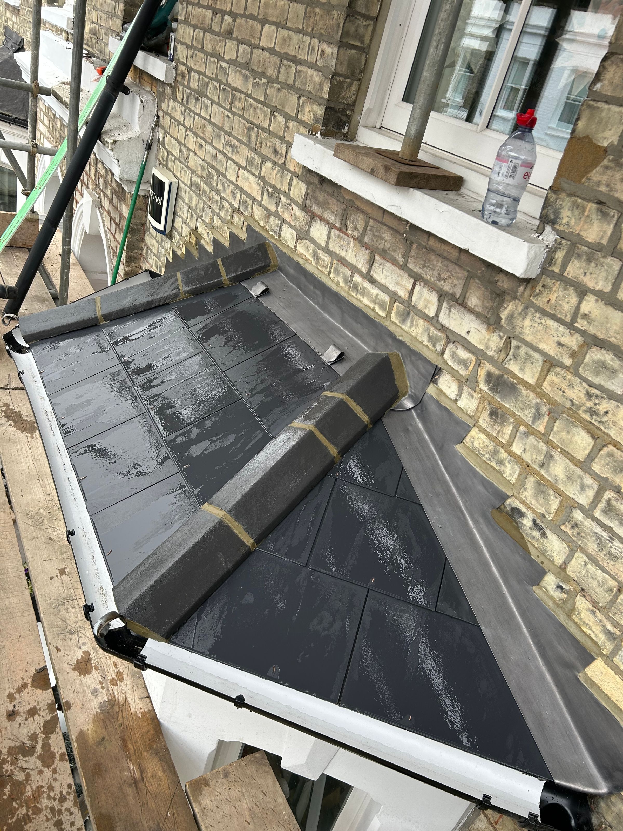 Rose height roofing's image