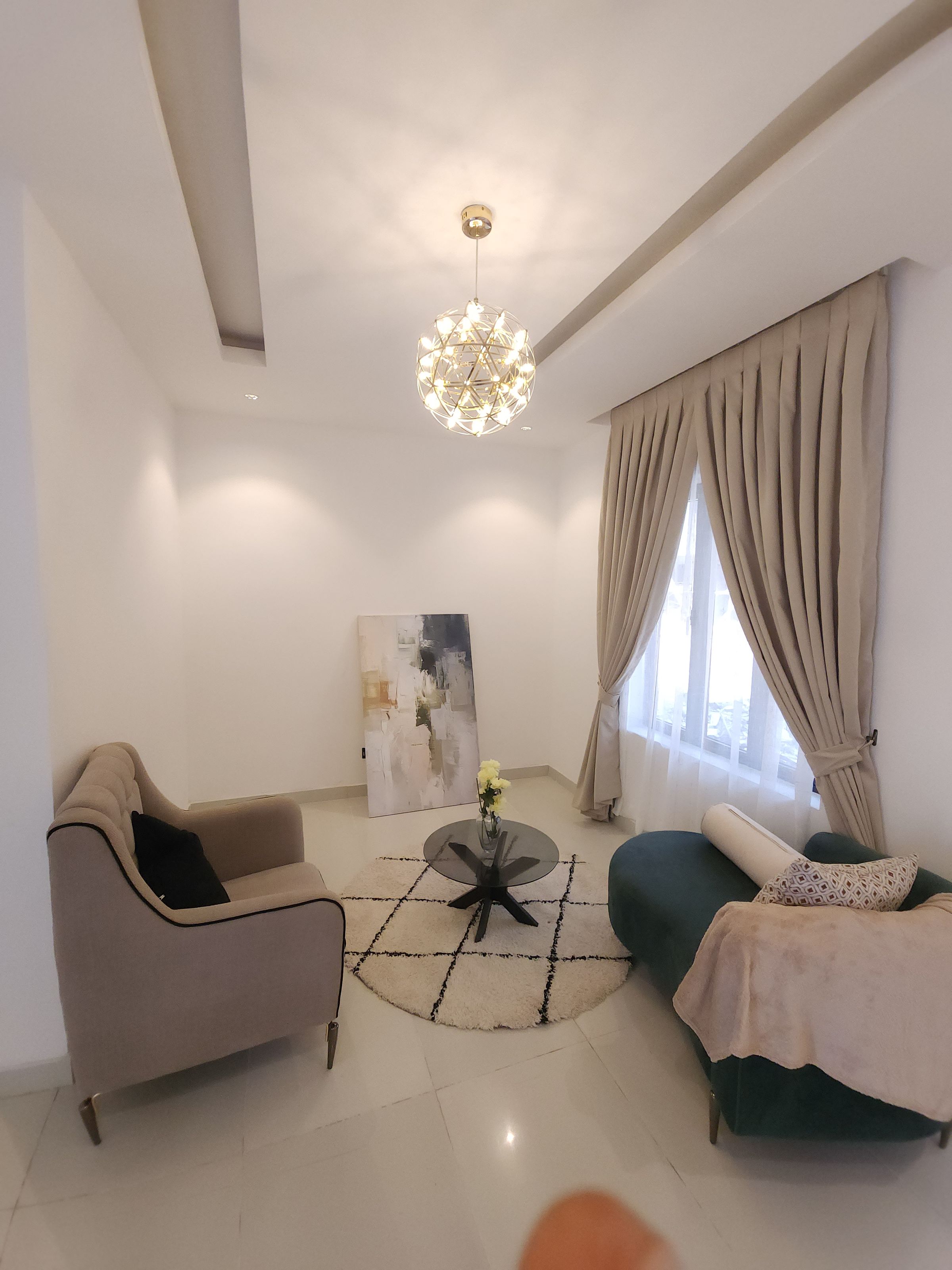 Sunlit Neutrals — A light-filled living space defined by warm tones, natural textures, and timeless simplicity.