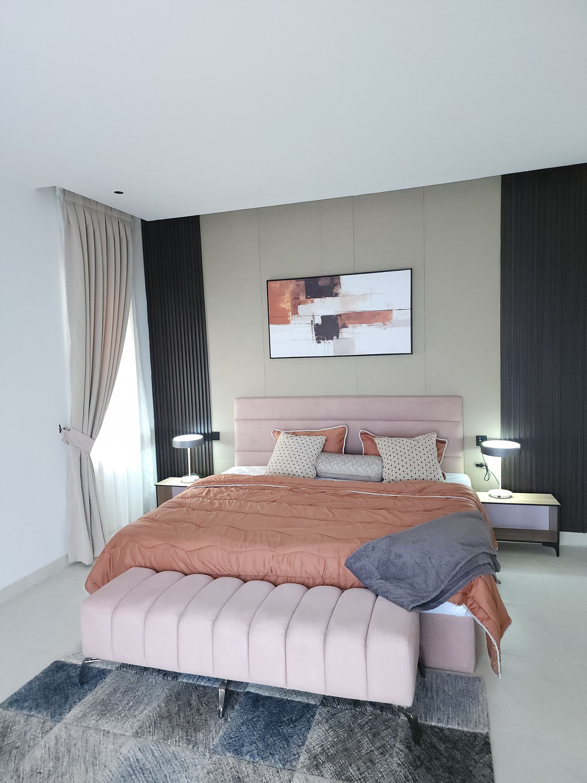 A calm, restful bedroom designed for comfort and relaxation.