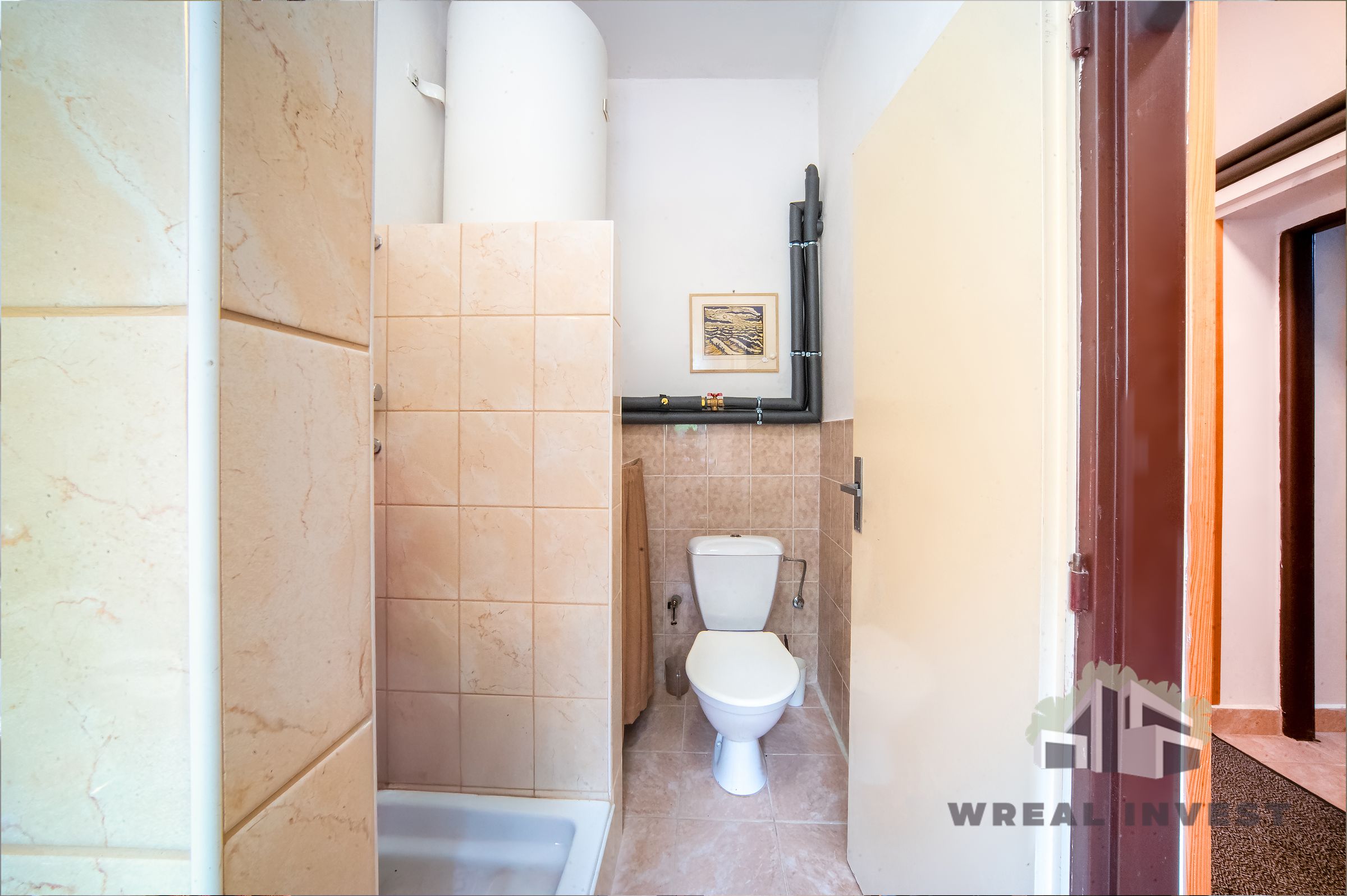 WREAL INVEST's image