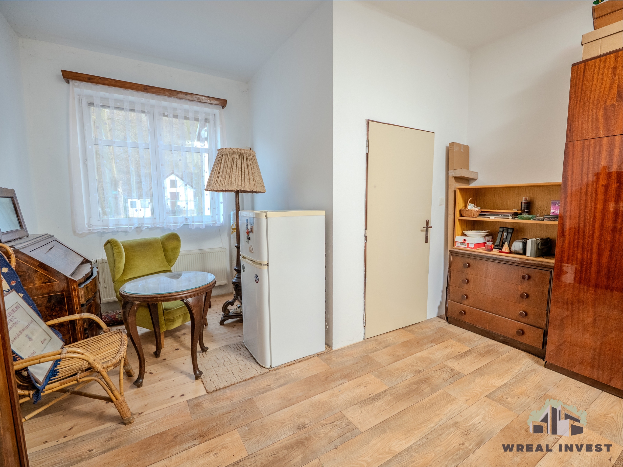 WREAL INVEST's image