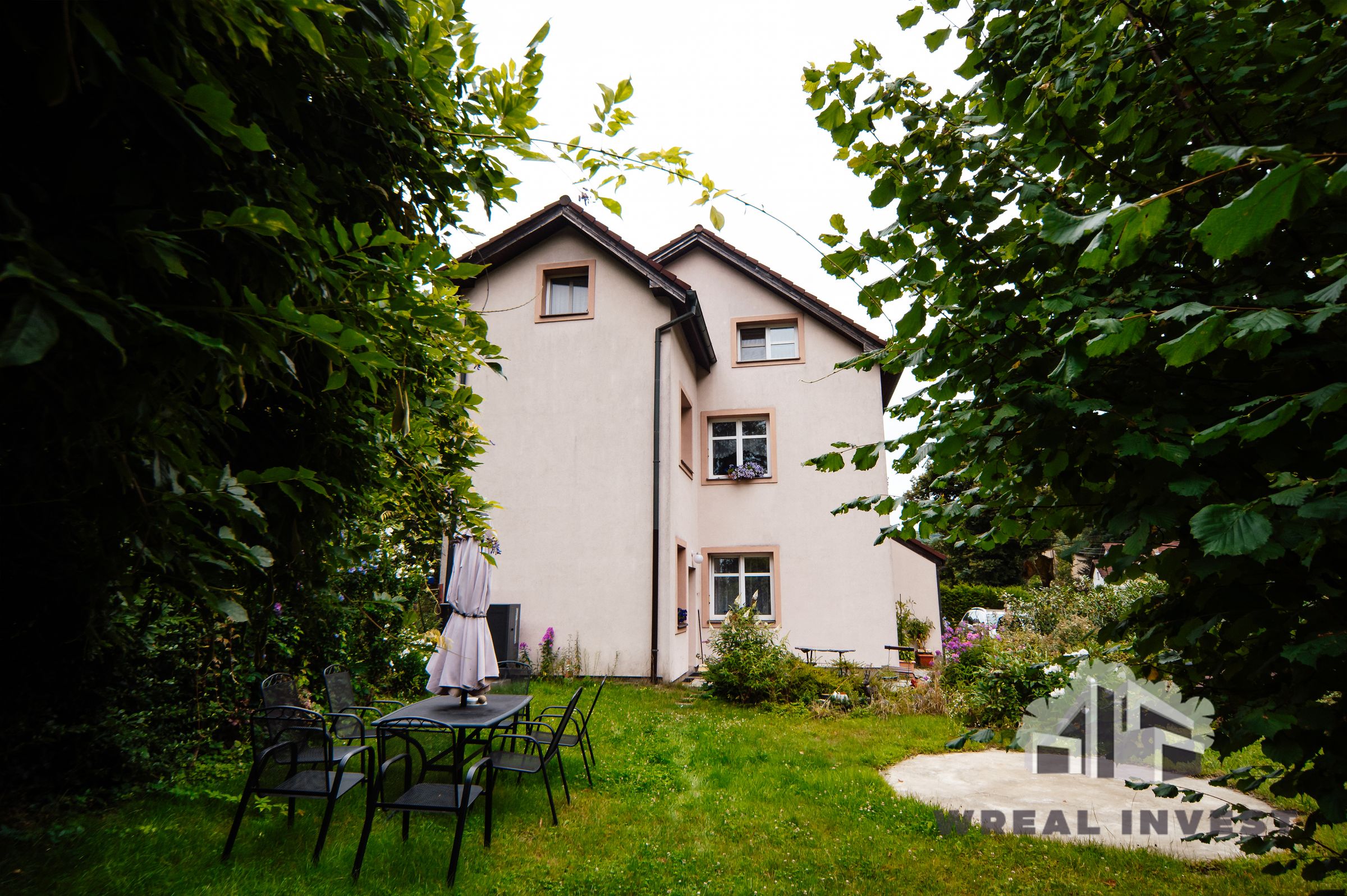 WREAL INVEST's image