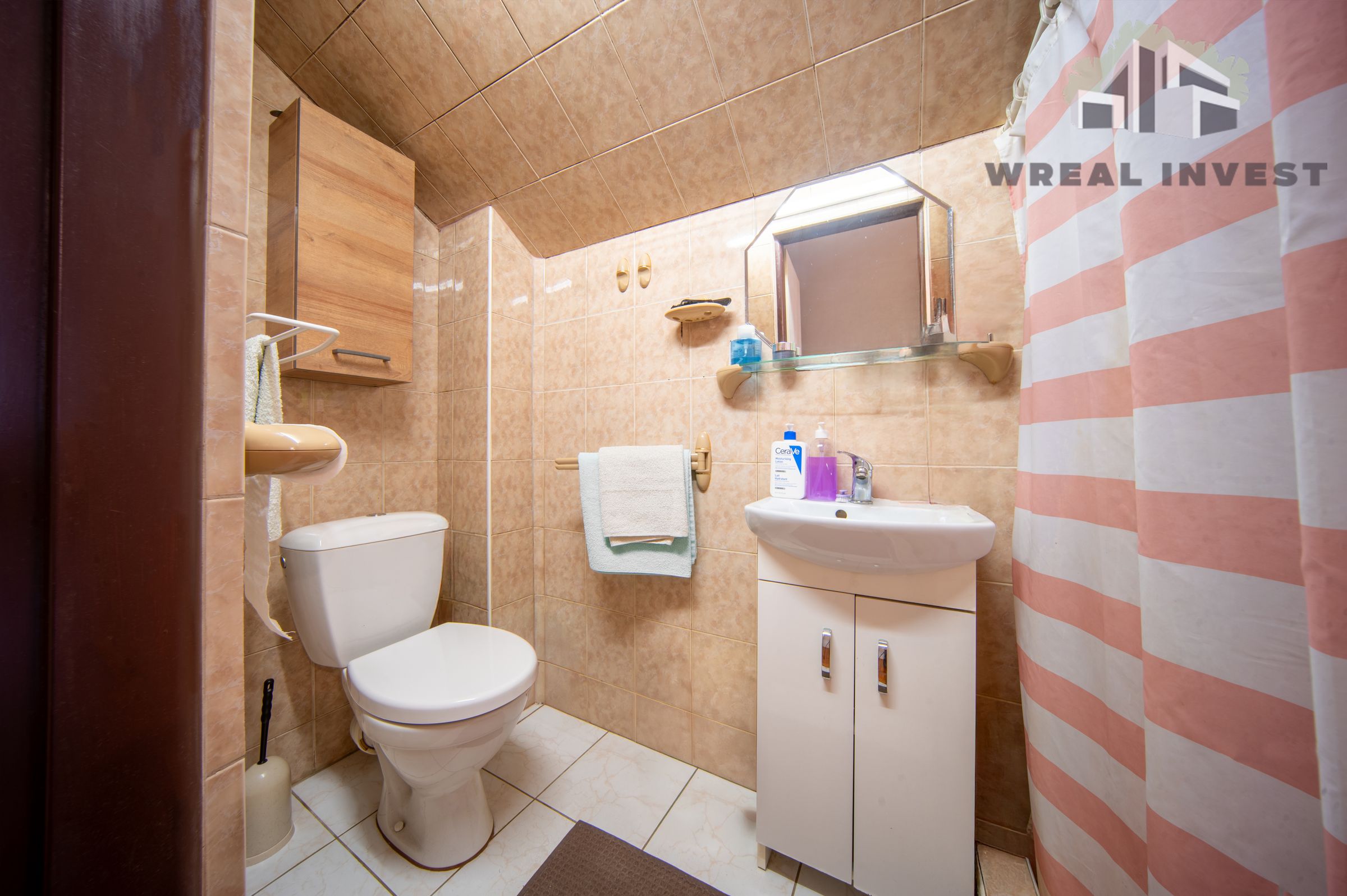 WREAL INVEST's image