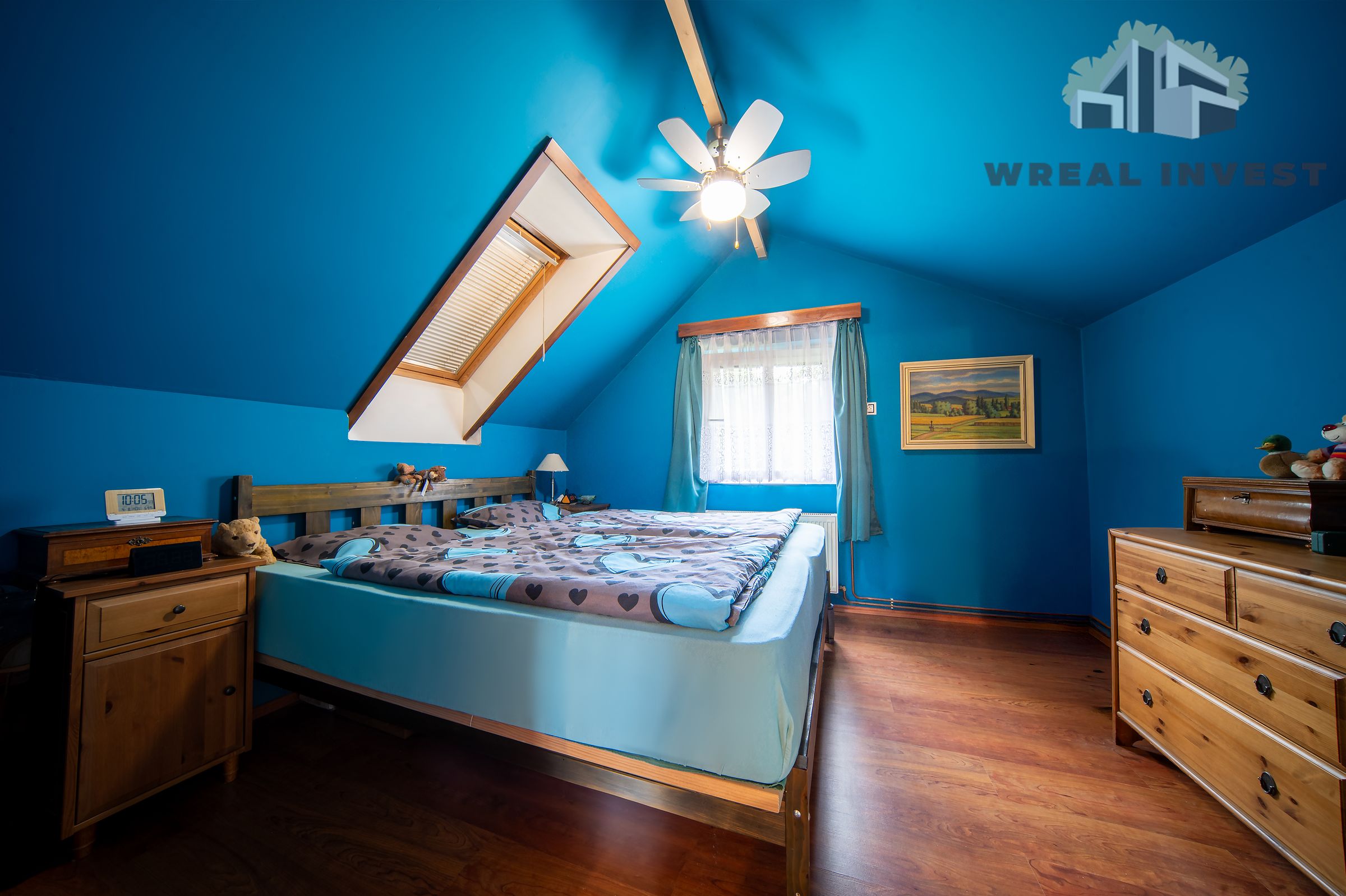 WREAL INVEST's image