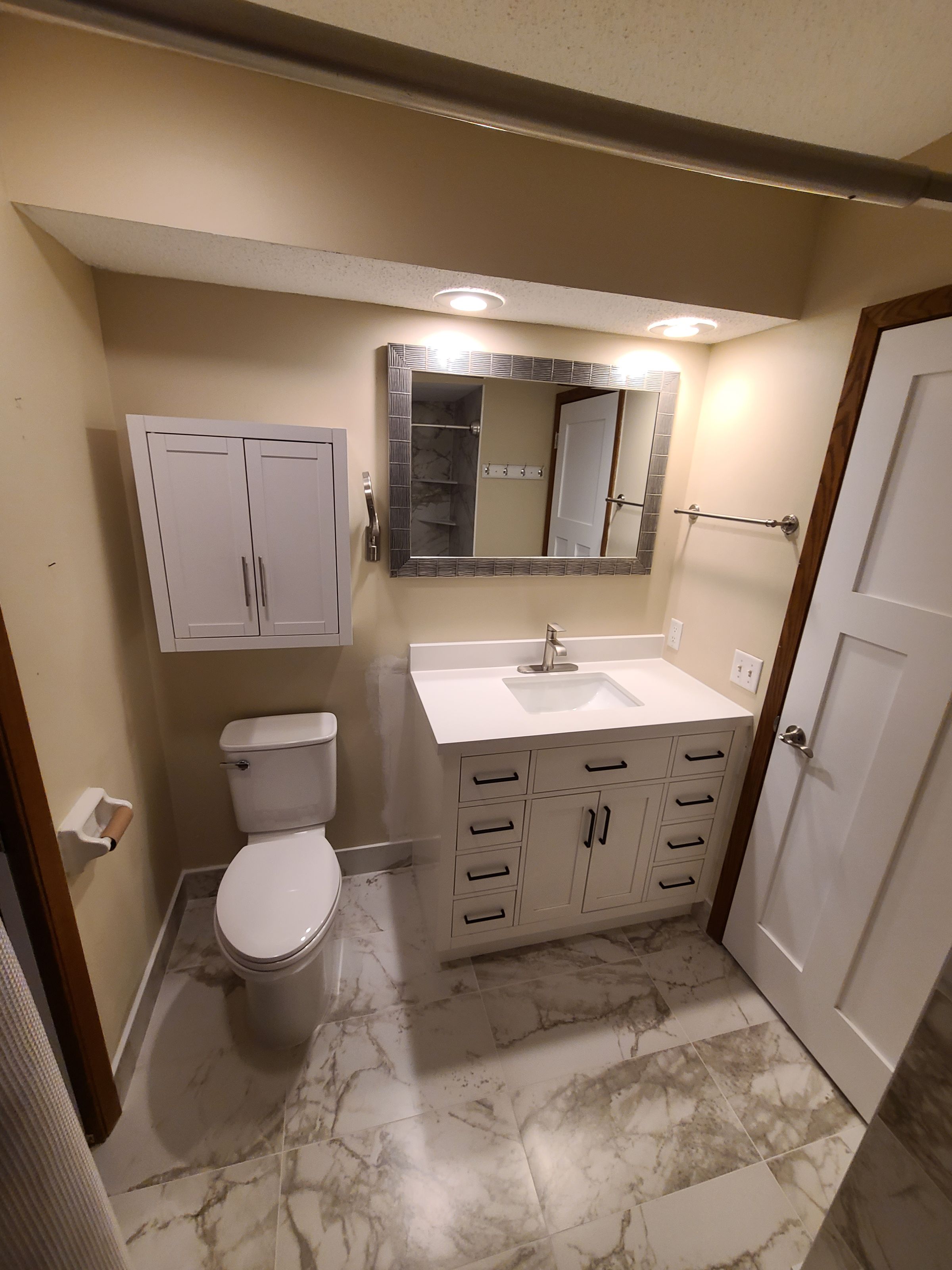 Bathroom remodel and Master bedroom floor replacement 