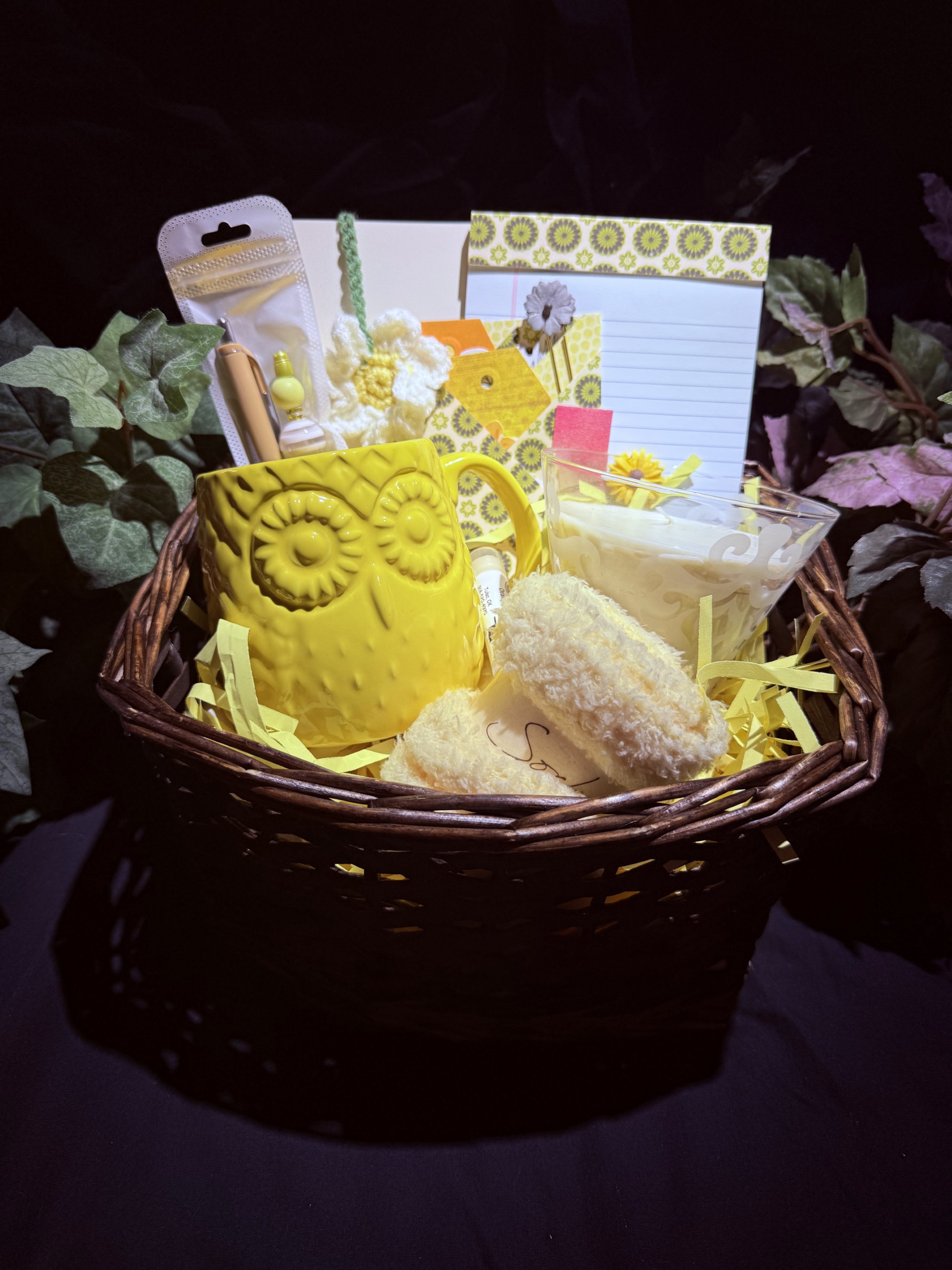 Mug, notebooks, pens, chapstick with holder, socks, candle, bookmark