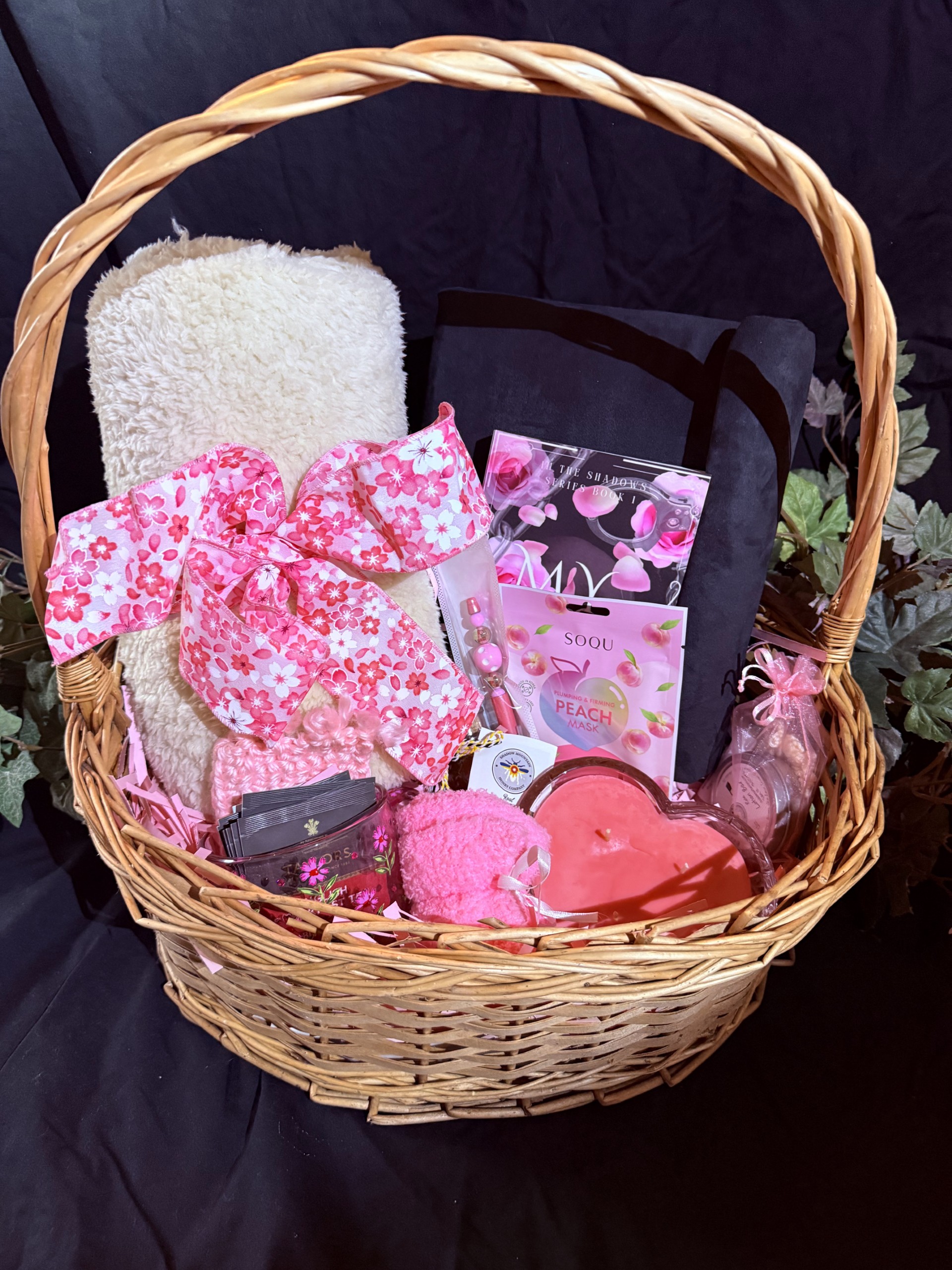 Blanket, book, mug, tea, mug rug, socks, candle, honey, pen, beauty mask, lotion, chapstick,  bookrest