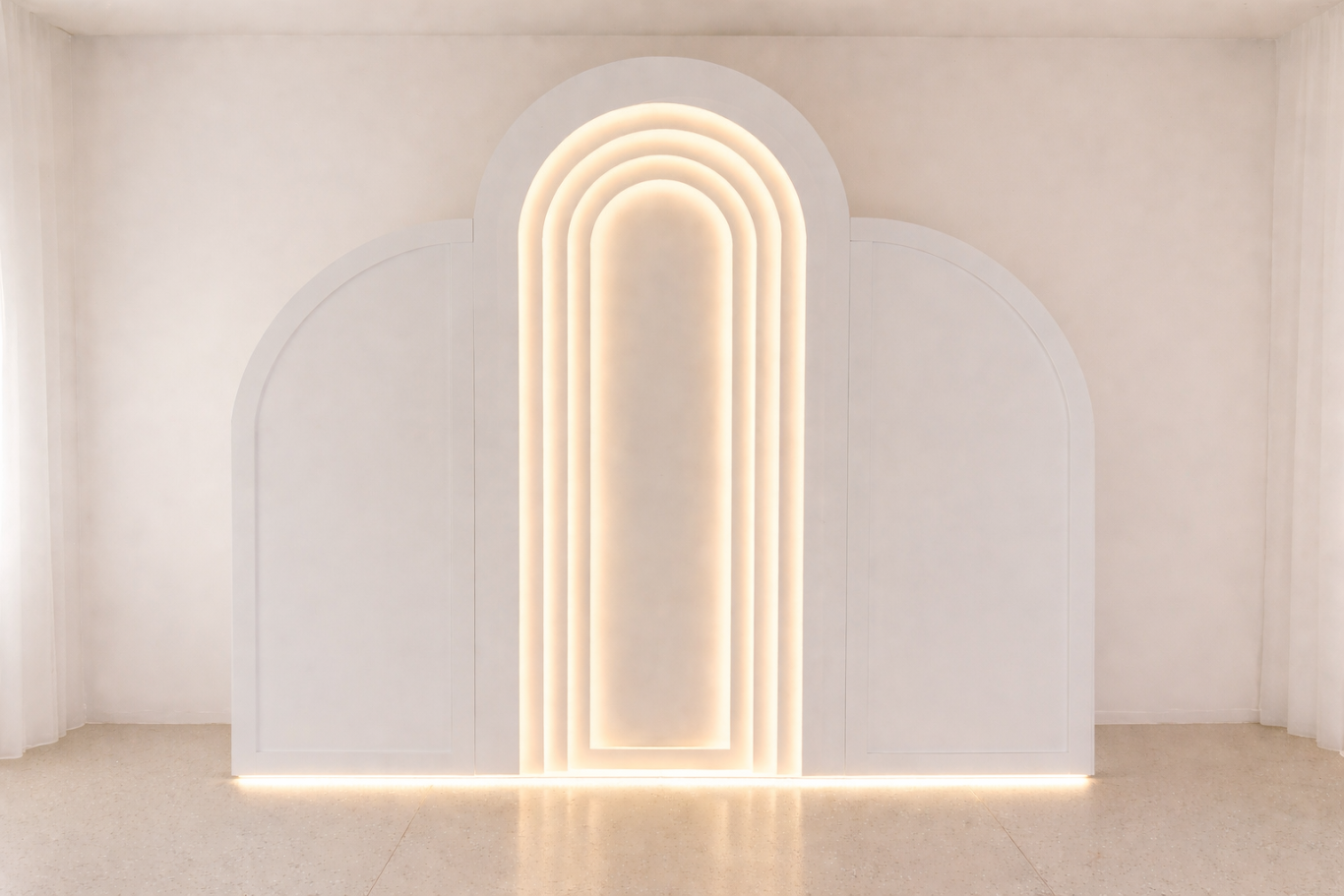 Lighted Arch - A clean, modern arch backdrop that elevates any event with a soft, elegant touch. Custom lighting options allow us to match your exact color theme, making it perfect for weddings, showers, and upscale celebrations.