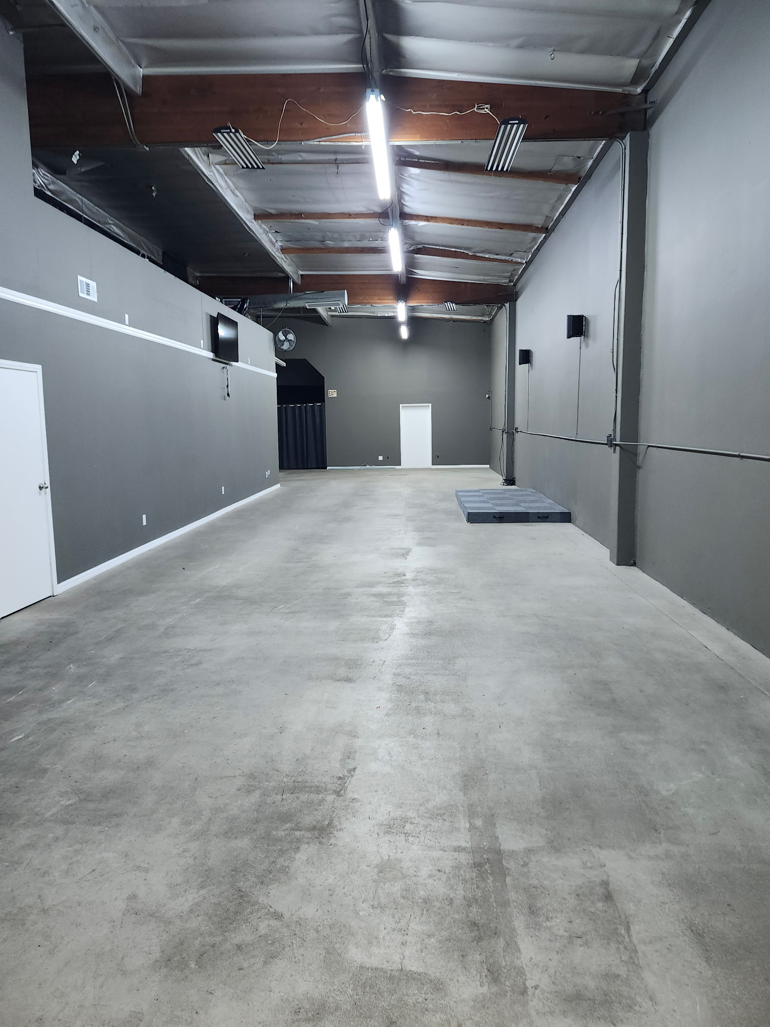 Angle 2 of Space showing TV and Fan