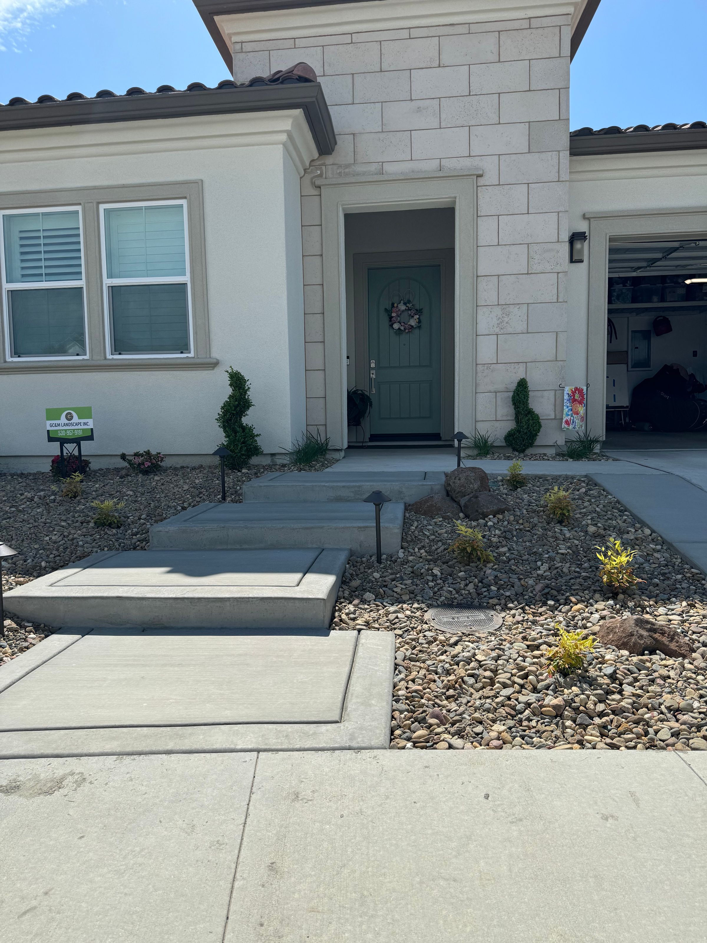 CONCRETE STEPS, LANDSCAPE LIGHTING, PLANTS & GRAVEL