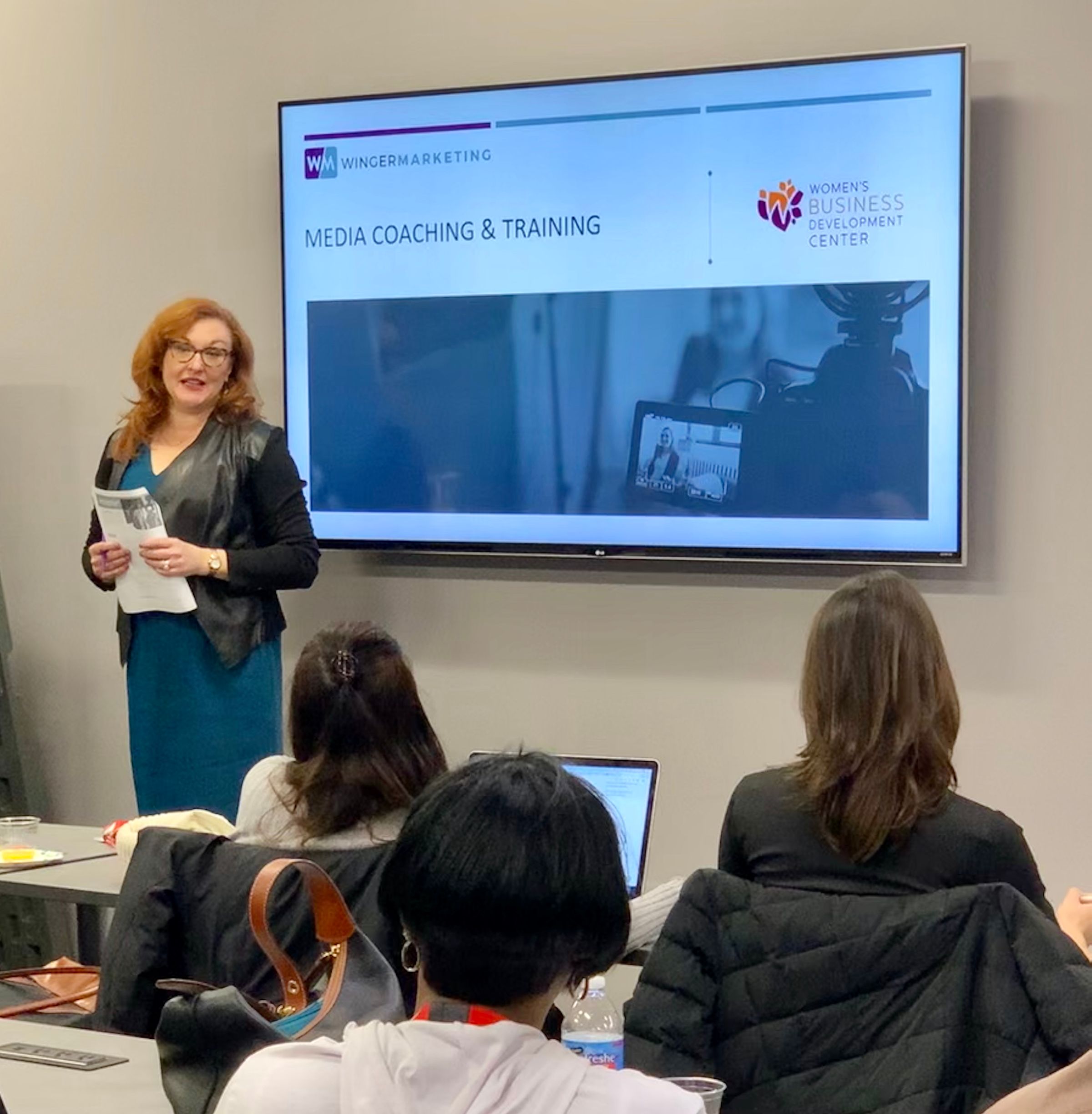 Karolyn Raphael conducts a media training workshop for the Women's Business Development Center.