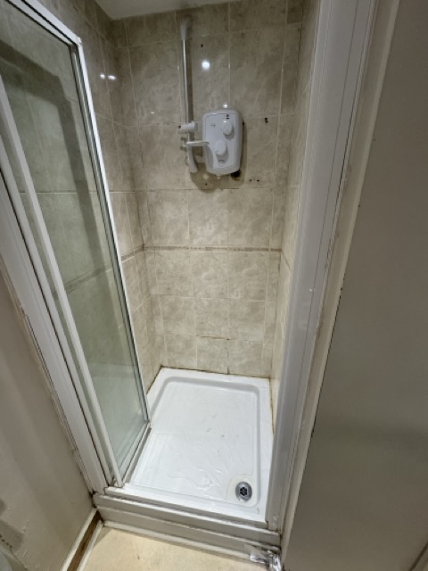 Outdated shower area in  Addlestone before bathroom renovation 